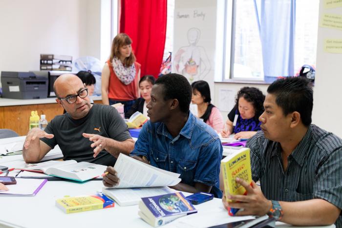 Adult students learning in a classroom setting