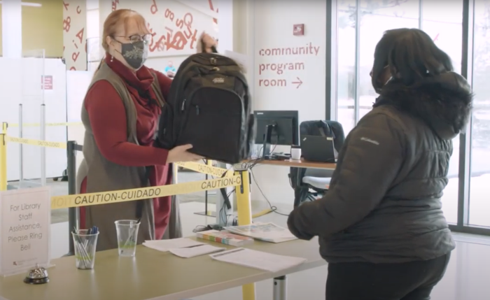 Ramsey County resident picks up their TechPak at local library.