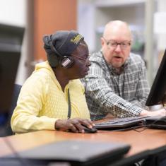 Two people working on adult foundational skills