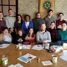 Group of alumni and members at a gathering
