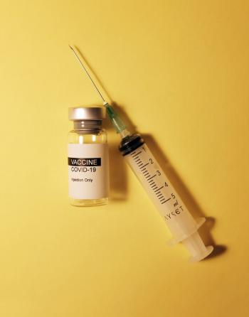 Covid-19 vaccine vial and syringe