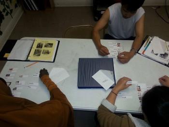 Students are pictured using the Literacy Work Stations.