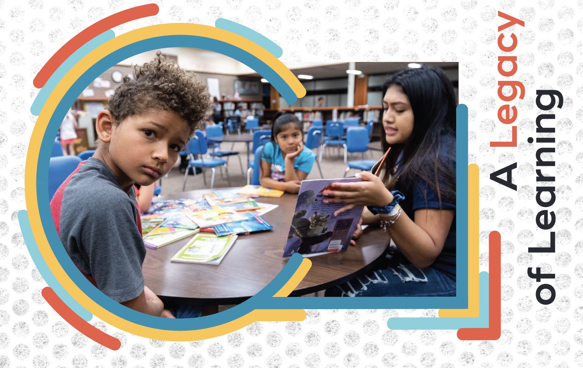 Two students from the Summer Reads program look into the camera as Danice Martinez reads to them.